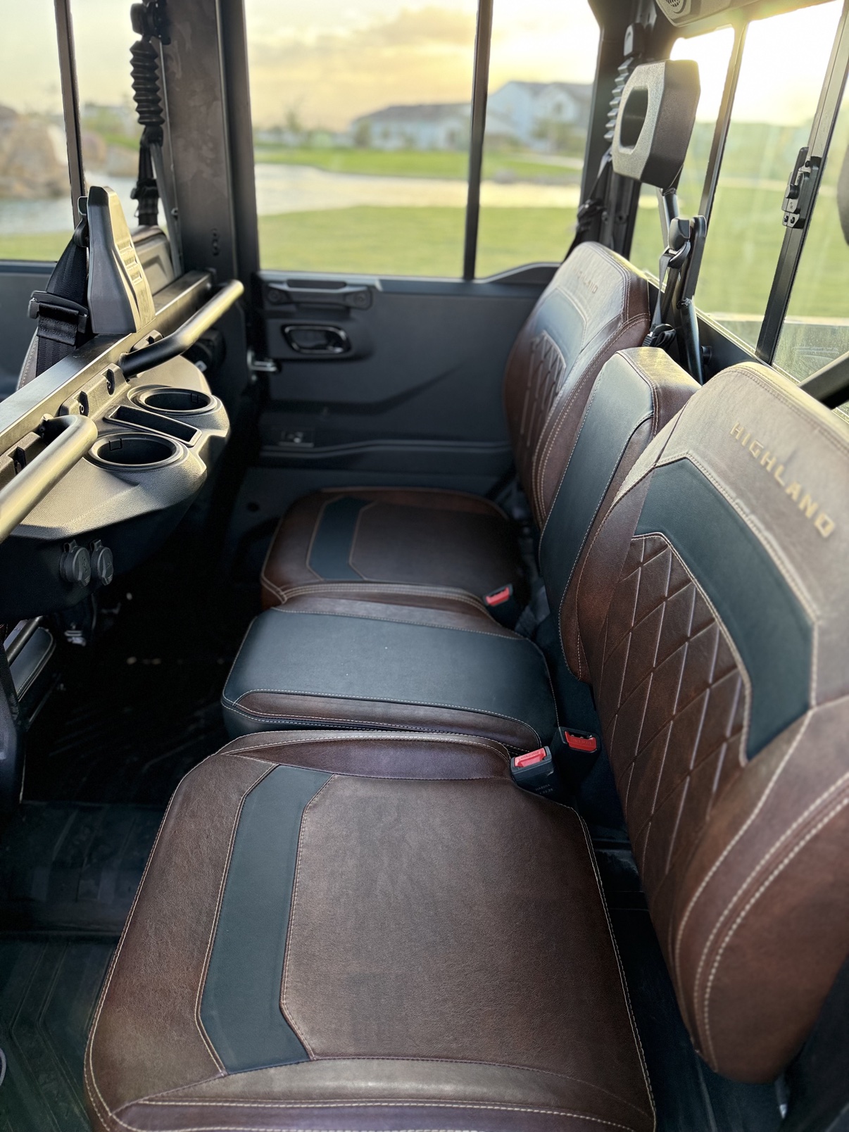 Rear bench seating inside the cab — two rows with room for six